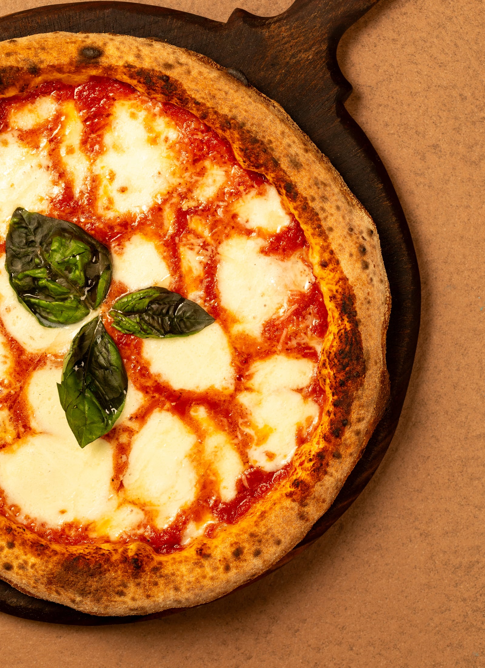 A finished Serious Slice pizza on the pass