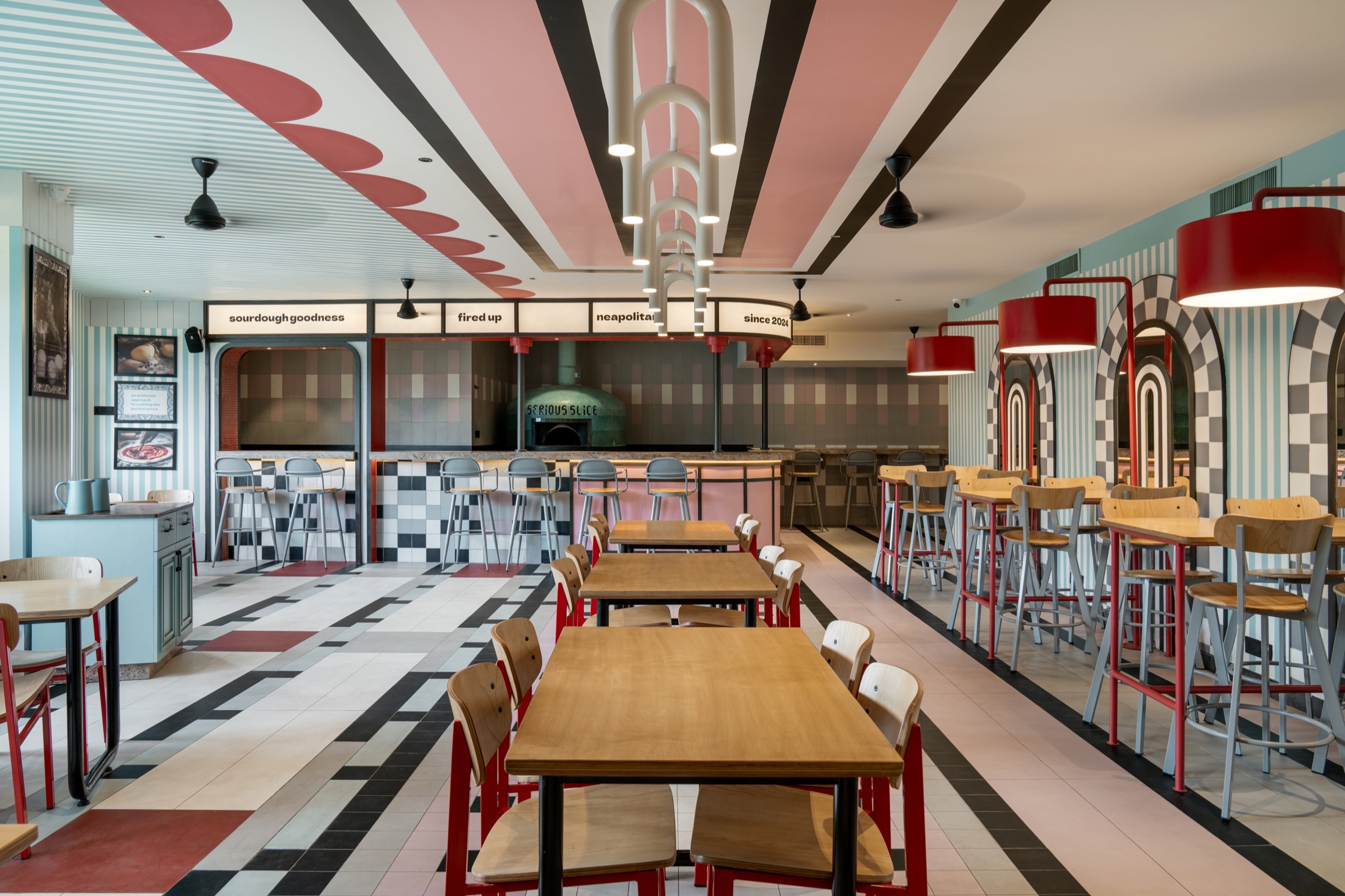 The colourful dining room at Serious Slice RR Nagar